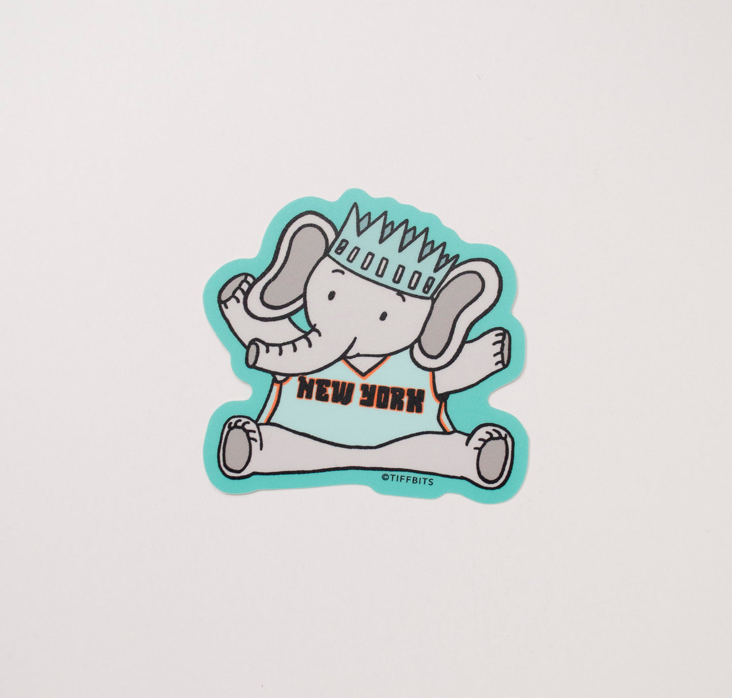 Sticker of the mascot Ellie the elephant of the NY Liberty WNBA team wearing her crown and teal jersey