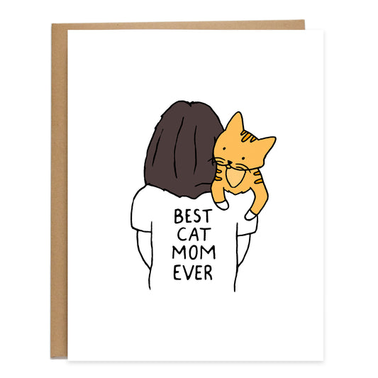 mom with mid length brunette hair with their back turned is holding a orange cat on their shoulder, the back of the shirt reads best cat mom ever