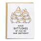a pile of corgi butts. card reads: have buttloads of fun on your birthday!