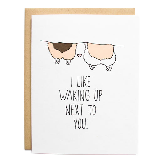 a tricolor and tan corgi butt under a blanket and the card reads, i like waking up next to you