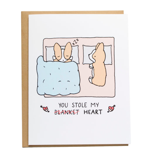 two corgis sleeping while one is awake without any blanket covering them. card reads, you stole my (blanket is crossed out) heart