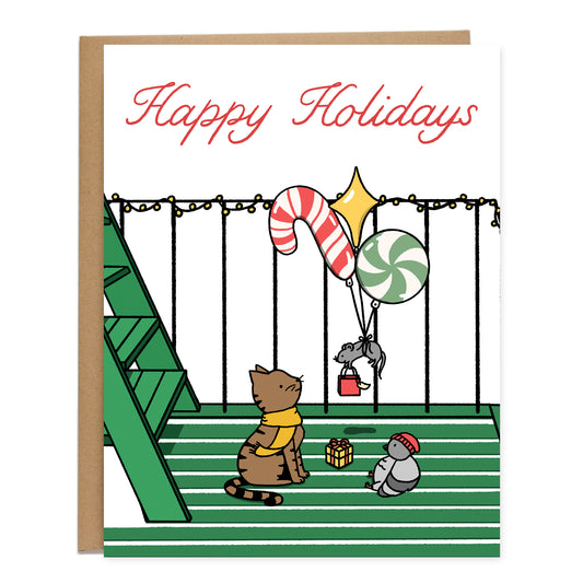Card of a holiday party on a green fire escape with a cat and pigeon looking up at a rat floating down attached to three holiday balloons holding a gift bag