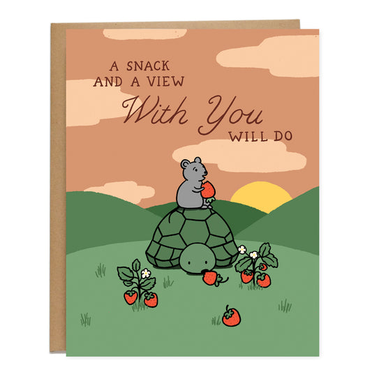 Card with a rat sitting on top of a turtle, both snacking on strawberries overlooking a sunset on green hills. The card reads, A Snack And A View With You Will Do