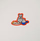 A drawing of a rat sitting at a baseball game with a slice of pizza in front of it and a mets hat cup filled with soft serve ice cream
