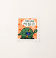 A sticker design mimicking a stamp shaped border with a drawing of a turtle delivering mail and it reads, trying my best