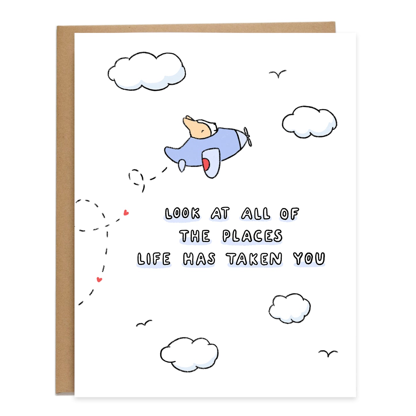 a drawing of a corgi flying in a cornflower blue plane surrounded by clouds and the card reads, look at all of the places life has taken you in a bubbly style
