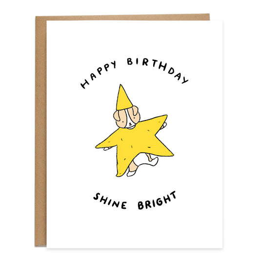 a drawing of a corgi in a star costume, text reads, happy birthday, shine bright