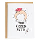 a corgi butt with a red graduation cap on it, the card reads, you kicked butt!