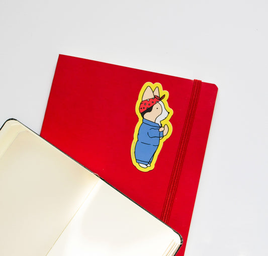 sticker on red notepad